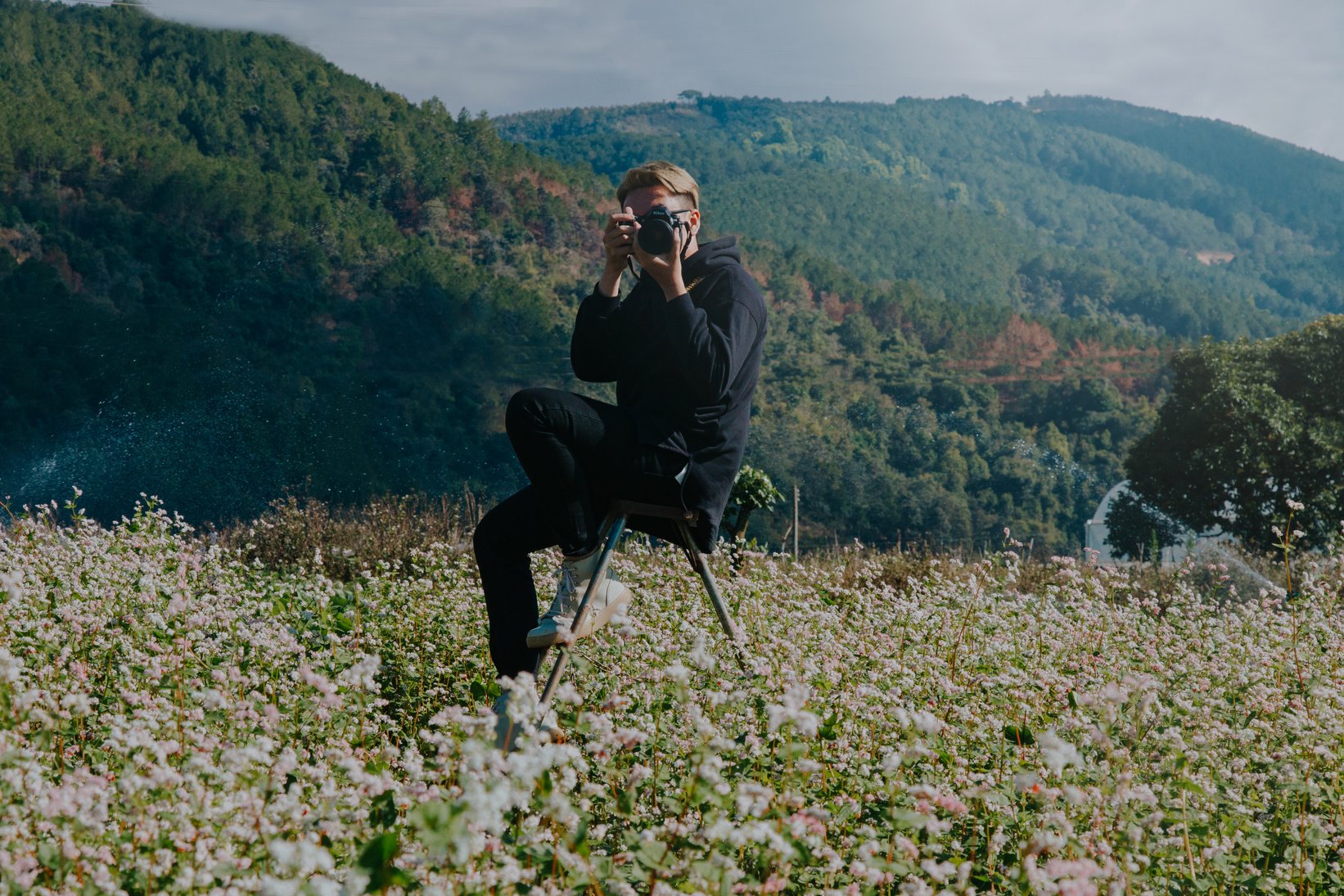 Photo of Man Using Camera